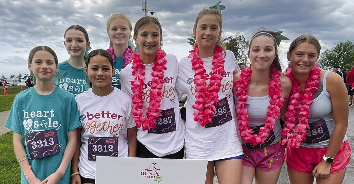 EXCELSIOR SPRINGS Middle School students Layla Hudson (from left), Lexy Martin, Cassie Wenz, Haleigh McCray, Reese Ryan, Libby Ringenberg, Luna Bigham and Addi Lingle participate in the Girls on the Run 5K in Kansas City. The Girls on the Run non-profit organization inspires young ladies to be joyful, healthy and confident. Submitted