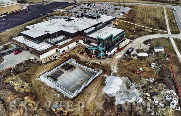 BACKFILLING IS COMPLETED at the outdoor pool, and crews have started pouring footings for the dome and splash pad. Fencing will soon be done at Century Park in order to reopen the playground. SKYVUER IMAGERY | Submitted