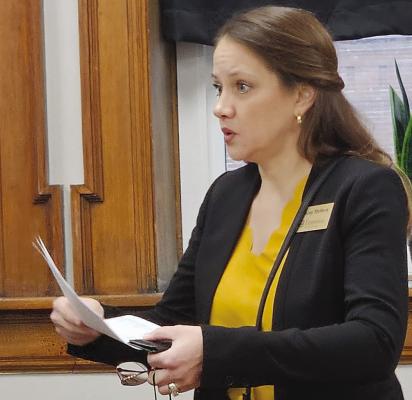 MU EXTENSION REGIONAL DIRECTOR Stacey Steffens presents budget materials while discussing MU Extension services with county officials. MIRANDA JAMISON | Staff