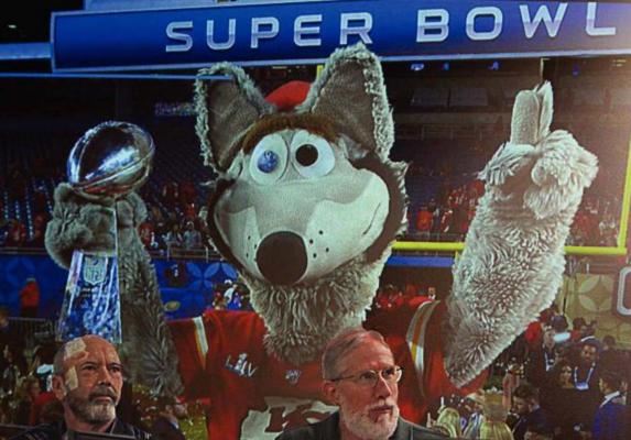 A PROJECTION during the annual Mayor’s Prayer Breakfast shows KC Wolf holding the Super Bowl trophy won in February by the Kansas City Chiefs. J.C. VENTIMIGLIA | Staff