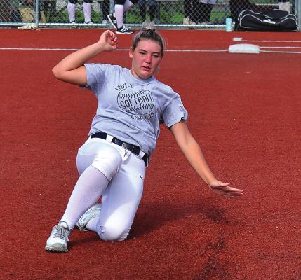 JUNIOR AVORY MOORE practices sliding into second base. DUSTIN DANNER | Staff
