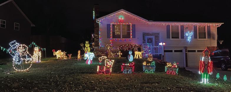 CURB APPEAL winners Brenda and James Bailey light up their neighborhood with festive decor. LAURA MIZE | Submitted