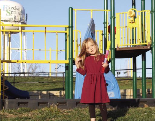 AURORA K. TAFF, 5, takes advantage of the warmer weather with playtime at the park. MIRANDA JAMISON | Staff