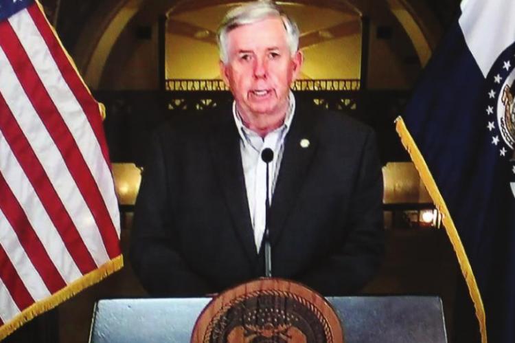 GOV. MIKE PARSON gives a coronavirus update at the Capitol in Jefferson City on March 27.