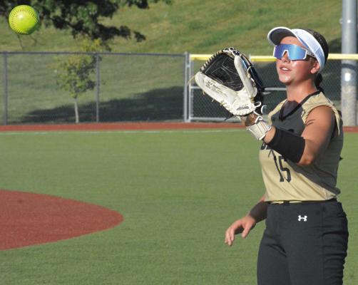 SOPHOMORE OUTFIELDER Adi Mayfield plays catch between half-innings of Excelsior Springs’ varsity softball game with South Harrison. Look for additional coverage of Excelsior Springs softball and other sports programs on page 10. SHAWN RONEY | Staff