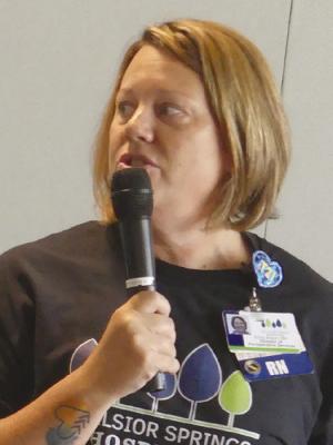 ELIZABETH BARNT | Staff EMILY BRAUN speaks to guests about robotics being used in surgical procedures.