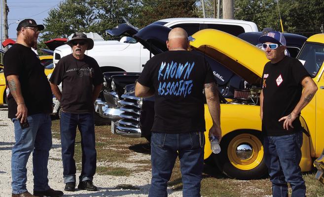 COMMUNITY MEMBERS attend the third annual Tat 2 You Car, Truck and Bike Show.