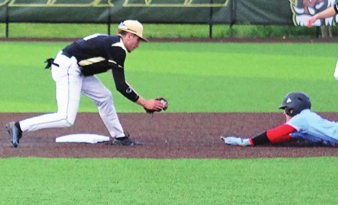 JUNIOR BRENDAN BLACKBURN puts the tag on a Clinton baserunner during an Excelsior Springs victory May 6. DUSTIN DANNER | Staff