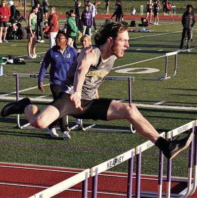 EXCELSIOR SPRINGS senior Gavin Wilmes clears a hurdle en route to a third-place finish in the boys 110-meter high hurdles April 6 at the Kearney Classic Invitational. TIM HARLAN | Submitted