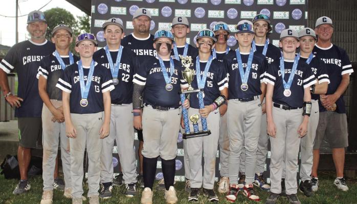 MEET THE ICE CRUSHERS: Front row (from left) Kaide Lowe, Bently Cramer, Kellan VanCampen, Jaxton Smith, Connor Marsh; second row, Halen Aldana, Tristan Schmidt, Kolt Nielsen, Mason Fields, Braydon Pearson, Bennett Hughes; back row, coaches Andy Cramer, JP Nielsen, Richie Marsh. DUSTIN DANNER | Staff