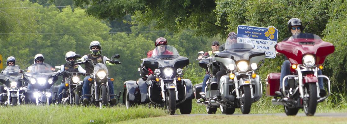 BIKERS PREPARE to stop at the Eagles Club in Excelsior Springs to receive refreshments, rolling dice to raise additional funds and participate in a raffle to win prizes. ELIZABETH BARNT | Staff
