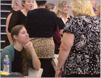 CHAMBER MEMBER Abigail Douglas enjoys talking to others during the luncheon. ELIZABETH BARNT | Staff