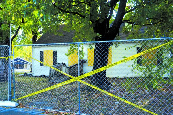 THE HOME OF KIDNAPPING and rape suspect Timothy Hasslett Jr. has been boarded by authorities as the investigation continues. TARA ALTIS | Staff