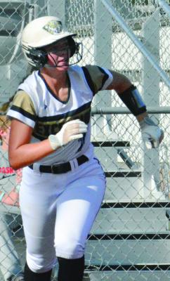 BELLA LOEFFERT hustles toward first base after putting the ball in play during Excelsior Springs’ Greater Kansas City Suburban Conferece-Blue Division varsity softball meeting with Grandview. Loeffert and her Tigers teammates crushed the Bulldogs 23-0 in 2.5 innings Monday at Miracle Field. The win put Excelsior Springs at 11-5 overall entering Thursday’s meeting with visiting Smithville. PHOTOS BY SHAWN RONEY | Staff