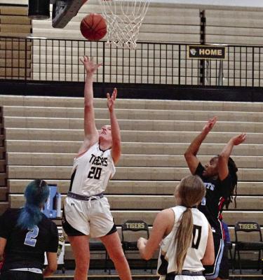 KINLEY ROGERS (No. 20) shoots a layup Jan. 4 against Southeast. DUSTIN DANNER | Staff