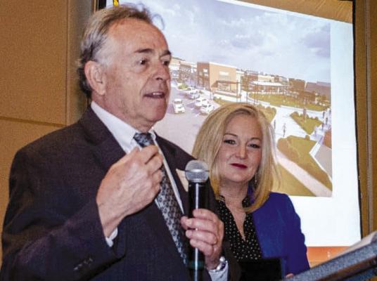 DAVE HORN, left, is recognized during a recent Keystone Awards luncheon. The honor is presented by Clay County Economic Development Council Chair Julie Sola, right. Submitted