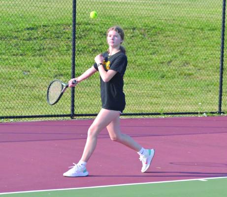 EVIE SELBY works on her forehand during tennis camp. DUSTIN DANNER | Staff