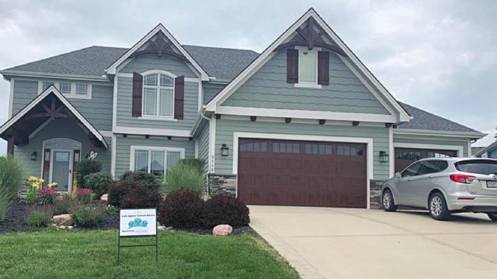 JUNE’S CURB APPEAL WINNER is this home in the Wornall neighborhood. The owners won a $25 gift card, sponsored by Blue Sparrow Lawn &amp; Landscape.