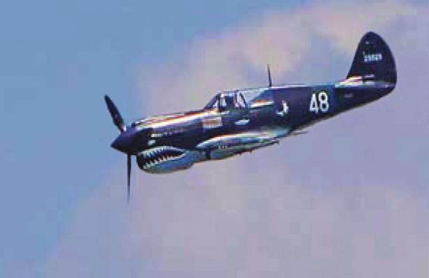 U.S. REP. Sam Graves flies this P-40 Warhawk during a Wings Over Whiteman air show. J.C. VENTIMIGLIA | Staff