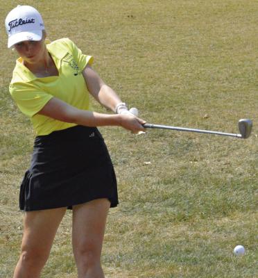 ELLIE LYNN hits a chip shot at the Richmond Invitational. SHAWN RONEY | Staff