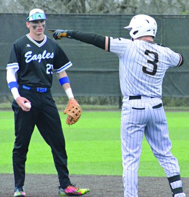 KLAYTON GLASPY (right), shown celebrating after an extra-base hit early in the season against Summit Christian Academy, is contributing to Excelsior Springs’ latest winning tear at bat and as a pitcher. SHAWN RONEY | Staff