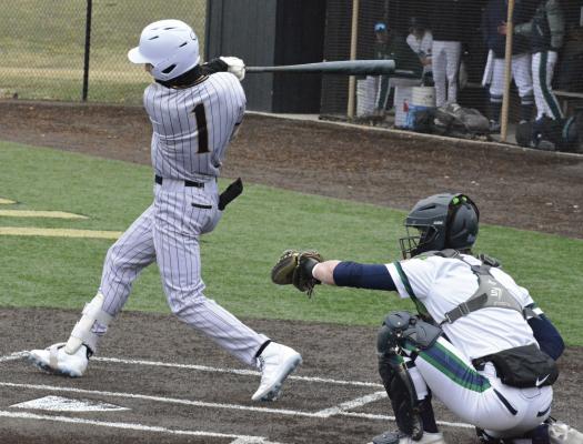 COOPER COLLINS (left), shown batting during a preseason jamboree, is among a slew of juniors suiting up for the Tigers in prep baseball. SHAWN RONEY | Staff