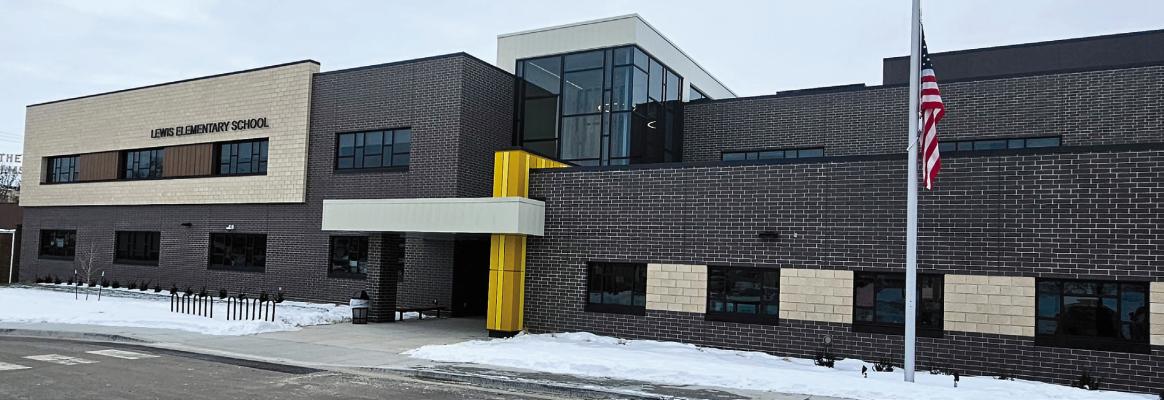 EXCELSIOR SPRINGS SCHOOL DISTRICT administrators discuss the success of the new Lewis Elementary following its opening day Jan. 13. MIRANDA JAMISON | Staff