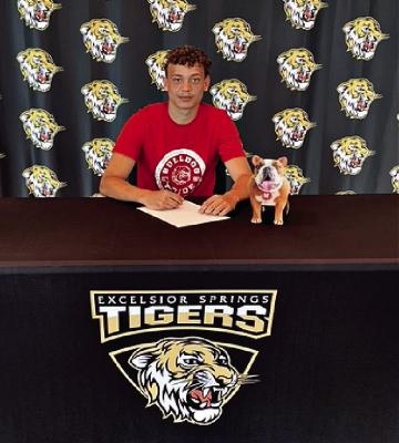 RAKAI GANTT signs his letter of intent to play men’s basketball at McPherson (Kan.) College. DUSTIN DANNER | Staff