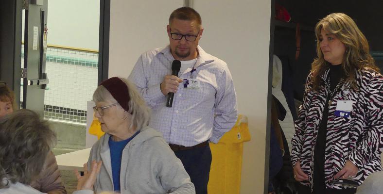 TROY GRIZZLE, physician practice manager (left) and Tina Cook, community education coordinator answer questions regarding local healthcare options. ELIZABETH BARNT | Staff