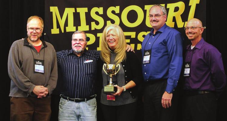 THE 2021 Missouri Press Association Gold Cup Sweepstakes Award goes to The Richmond News for the third year in a row. The award is received Saturday at the Elms Hotel and Spa during the association’s annual three-day convention. From left are sports Editor Shawn Roney, Editor-in-Chief Jack “Miles” Ventimiglia, association President Liz Irwin, Publisher Brian Rice and Excelsior Springs sports writer Dustin Danner. PATRICIA M. VENTIMIGLIA