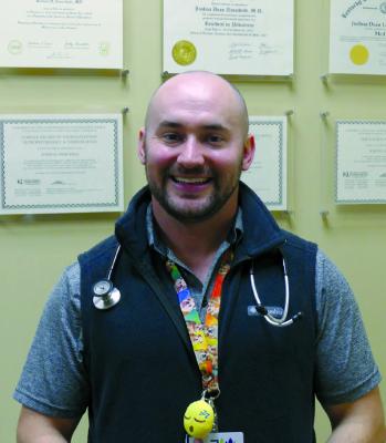 DR. JOSHUA UMSCHEID explains how to treat a common cold and fevers in young children. ELIZABETH BARNT | Staff