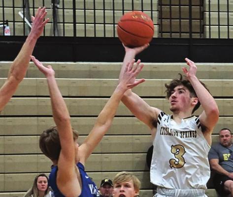 JUNIOR BRENDAN BLACKBURN puts up a floater for two points in an Excelsior Springs victory last week over visiting Harrisonville. DUSTIN DANNER | Staff