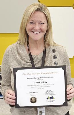 TRACI WHITE, Cornerstone Elementary staff member, proudly displays her certificate. Submitted