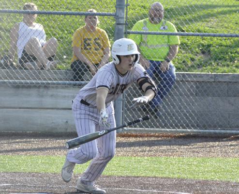 EXCELSIOR SPRINGS CATCHER Mason Danner drops his bat and bolts toward first base after laying down a fourthinning bunt during the Tigers’ 9-0 Class 4 state sectional victory Tuesday over visiting Maryville. SHAWN RONEY | Staff