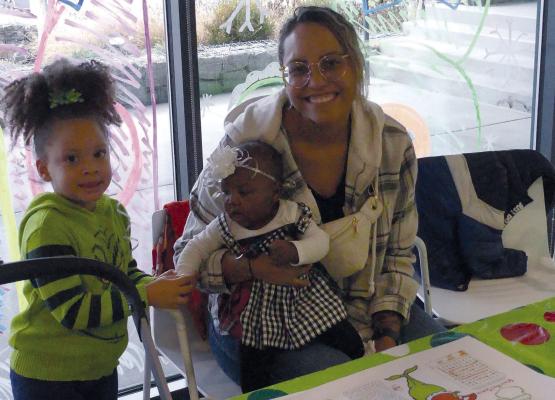 LILY BARRAGAN (from left) and Kaylee and Khloe Carter show off their new holiday hairdos in Whoville. ELIZABETH BARNT | Staff