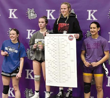 EXCELSIOR SPRINGS High School freshman Lilly Goetz (second from left), battles her way to district runner-up and becomes a Class 1 state qualifier. Look for additional girls wrestling coverage on page 7. Submitted