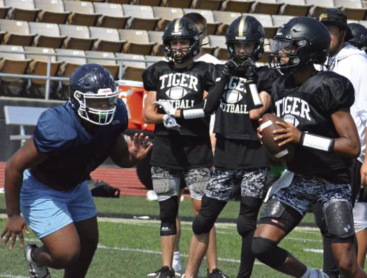 SOME UPCOMING multiteam football scrimmages at Excelsior Springs are turning July into a month of joy. SHAWN RONEY | Staff
