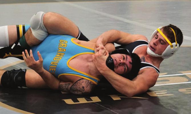 JUNIOR AYDEN DOLT, seen here earlier in the season, represents the Tigers in the 145-pound weight class this week at Class 2 state competition. DUSTIN DANNER | Staff