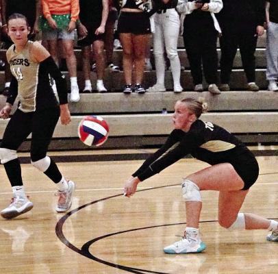 EXCELSIOR SPRINGS junior Maya Watkins steps forward for a dig during a recent match. TIM HARLAN | Submitted