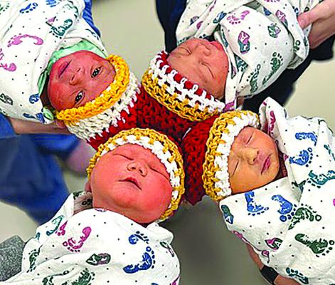 TOPPED WITH Kansas City Chiefs hats, these Liberty Hospital Birthing Center babies huddle to share strategies for the upcoming Super Bowl game, where the Chiefs will take on the Philadelphia Eagles. Submitted