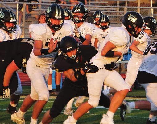 DEFENSIVELY, the Tigers, seen here Aug. 27 in their season and home opener against Savannah, will have their hands full Friday night, when they visit Harrisonville and face the Wildcats, who possess a potent rushing attack. DUSTIN DANNER | Staff
