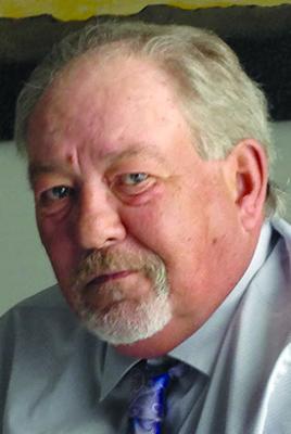 KARL E. HOUCK
