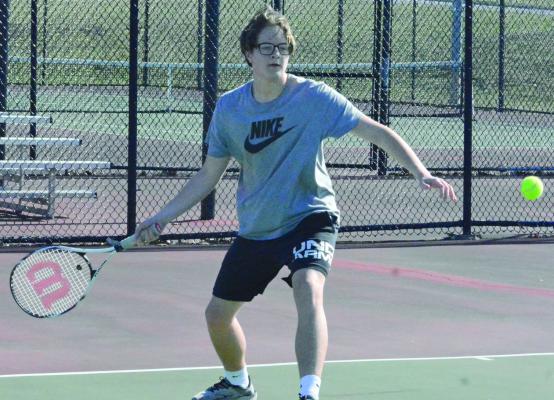 AIDEN ISHMAEL sets up to attempt a forehand shot near the baseline. Ishmael is among six juniors with the program, per the Missouri State High School Acitivities Association (MSHSAA) website.