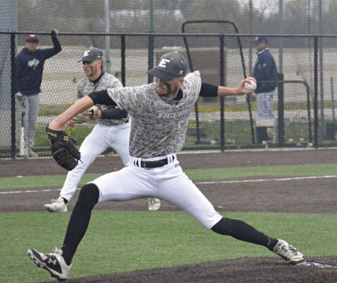 COLSON MOORE provides some late-inning relief during Excelsior Springs’ April 15 loss to Oak Park. SHAWN RONEY | Staff