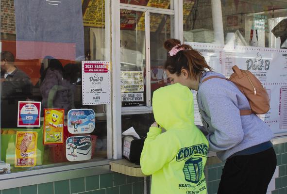LOCAL RESIDENT Ed Weidler shares his story of the kindness shown to him by the Dari-B staff. Lanie Marshall (shown above) enjoys sharing the opening day Dari-B tradition with her children. MIRANDA JAMISON | Staff