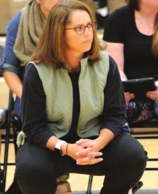 THEN: TERRI IRONS watches from the sidelines as she coaches Excelsior Springs in varsity volleyball. COURTESY OF THE ESHS ATHLETIC HALL OF FAME FACEBOOK PAGE