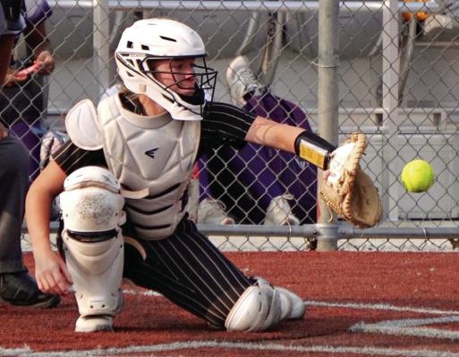 JOSIE CASLER keeps her eyes on the ball as she receives a strike during Excelsior Springs’ Sept. 10 home-opening victory over North Kansas City. DUSTIN DANNER | Staff