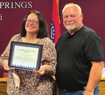 IN 2021, Brenda and Brad Eales receive the Historic Preservation Commission’s Commercial Property Award for their work to improve historic properties.