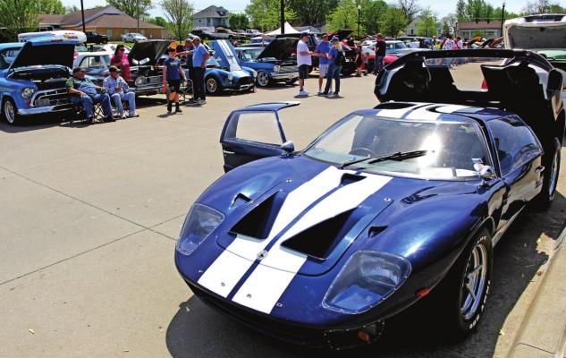 VINTAGE and modern vehicles drive guests to the car show during the 40th Annual Richmond Mushroom Festival in the municipal center parking lot. J.C. VENTIMIGLIA | Staff