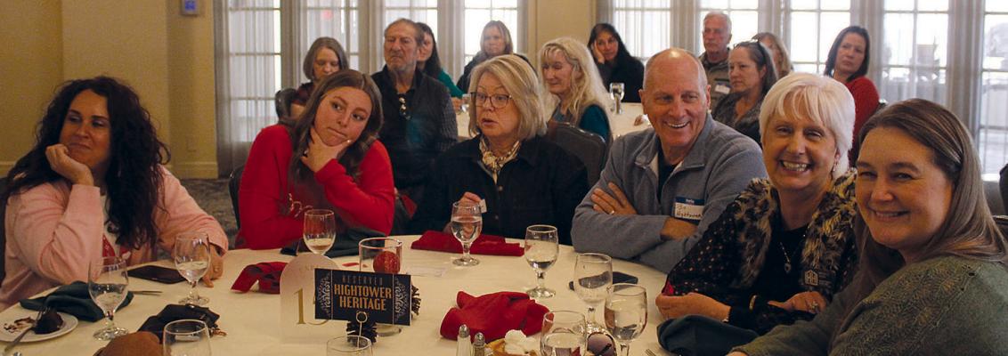 HIGHTOWER HERITAGE REAL ESTATE team members join other chamber attendees in celebrating community achievements during the annual holiday luncheon. MIRANDA JAMISON | Staff